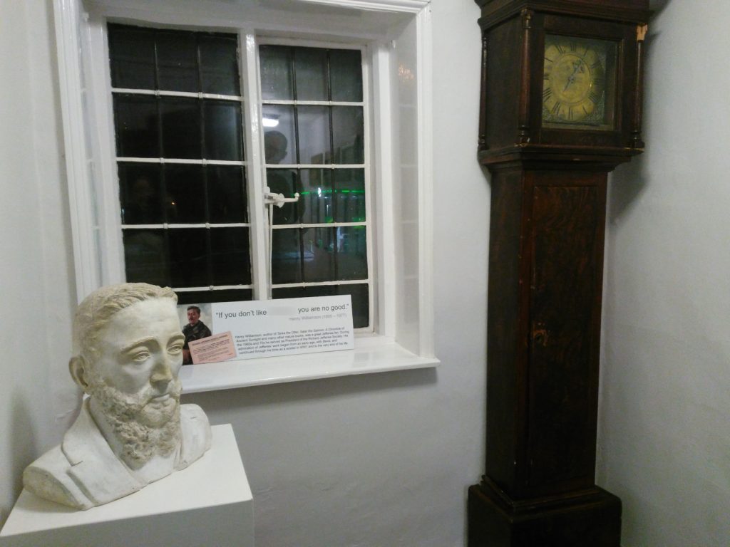 A bust and grandfather clock